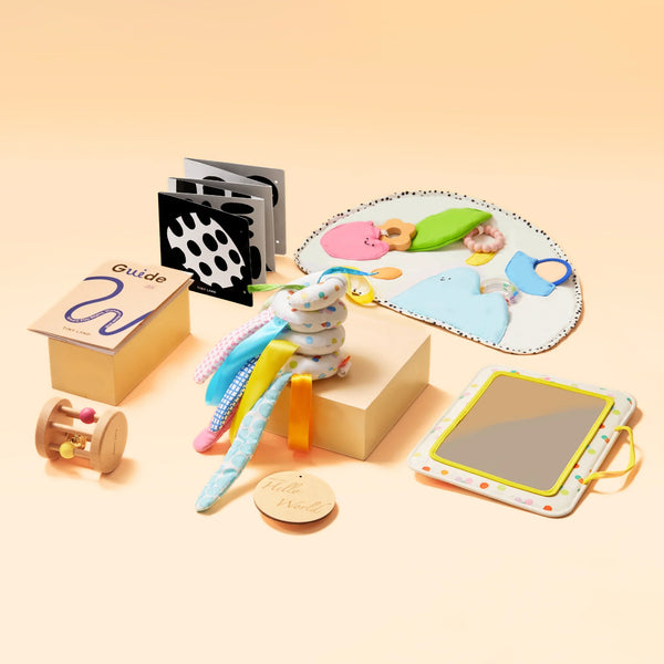 Tiny Land® Montessori Sensory Beginnings Baby Set for infants 0-6 months, showcasing engaging sensory toys at angle 4.