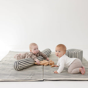 Bold Stripe Organic Cotton Mat for babies, featuring vibrant colors and a soft texture, perfect for playtime.