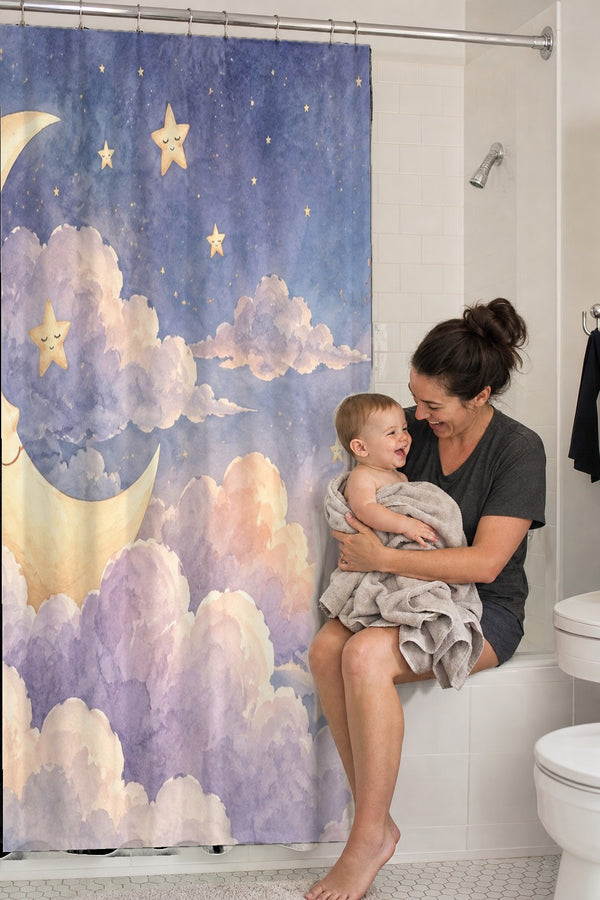 Mom holding her baby on the tub edge next to the Twilight Moon Hot Air Balloon shower curtain