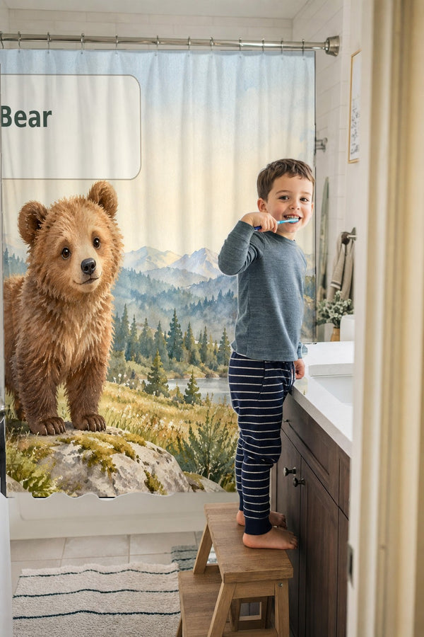 Child brushing teeth in a family bathroom with the B is for Bear Alphabet shower curtain
