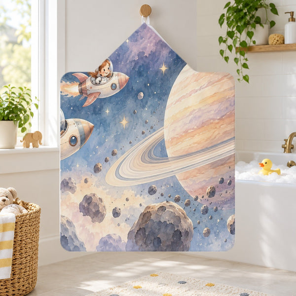 Space Explorers kids hooded bath towel hanging in a kids bathroom