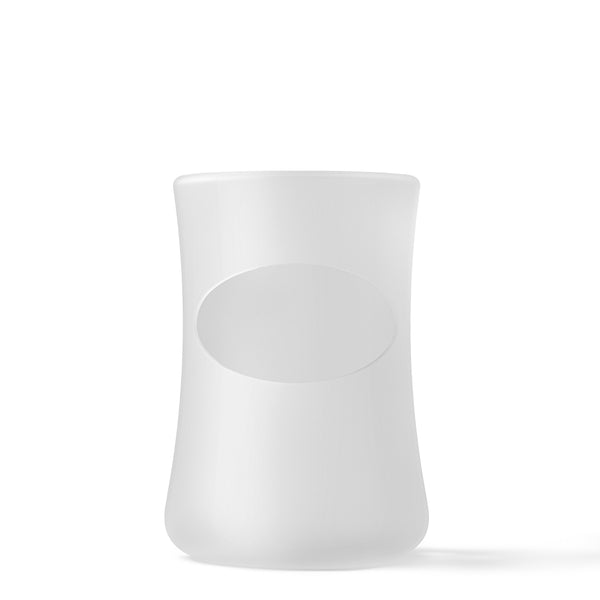 Mōmi silicone 4 oz glass bottle sleeves in various colors, designed for easy grip and protection. Angle 8 view.