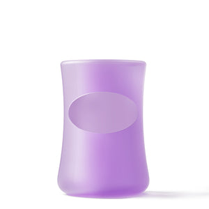 Mōmi silicone 4 oz glass bottle sleeves in vibrant colors, angle 7 view showcasing durability and style for baby bottles.