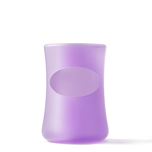 Mōmi silicone 4 oz glass bottle sleeves in vibrant colors, angle 7 view showcasing durability and style for baby bottles.