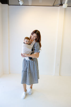 Coco Cream Cotton Linen Baby Carrier for infants 7-35 lbs, shown at angle 5, stylish and comfortable for parents.