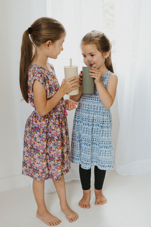 Colorful toddler cups with straw, perfect for little hands and easy sipping, angled view showcasing design and functionality.