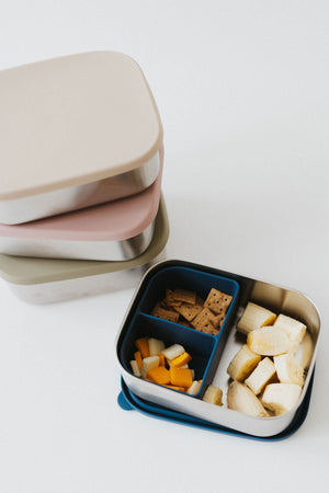 Stainless steel and silicone bento box for babies, perfect for food storage and on-the-go meals.