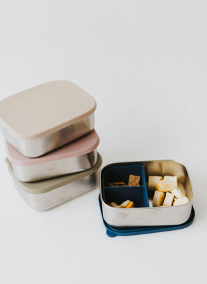 Stainless steel and silicone bento box for babies, perfect for food storage and on-the-go meals.