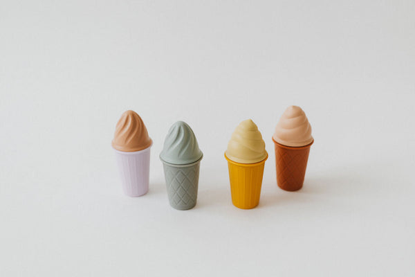 Colorful silicone ice cream cones for babies, perfect bath toys for fun and imaginative playtime. Angle 2 view.