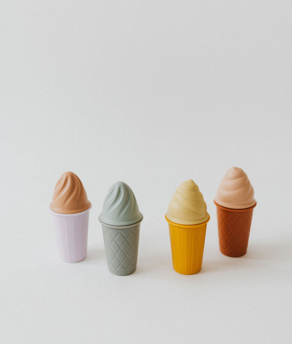 Colorful silicone ice cream cones bath toys for babies, angled view showcasing fun and safe playtime.