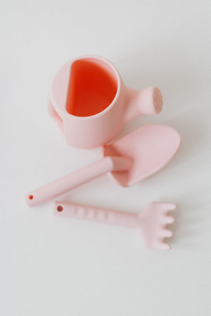 Silicone watering can set for babies, perfect for sand and beach play, shown from angle 6.