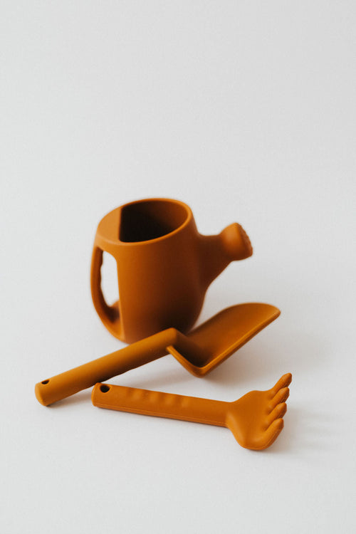 Silicone watering can set for babies, perfect for sand and beach play, shown from angle 2.