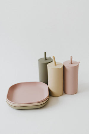 Colorful toddler cups with straw, angled view, perfect for little hands and easy sipping.