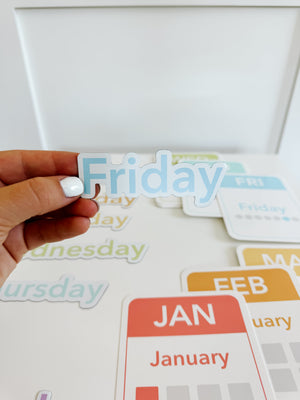 Colorful calendar flashcards and magnets for early learning, showcasing days, months, and seasons in a playful design.