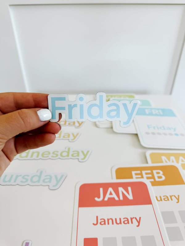 Colorful calendar flashcards and magnets for early learning, showcasing days, months, and seasons in a playful design.