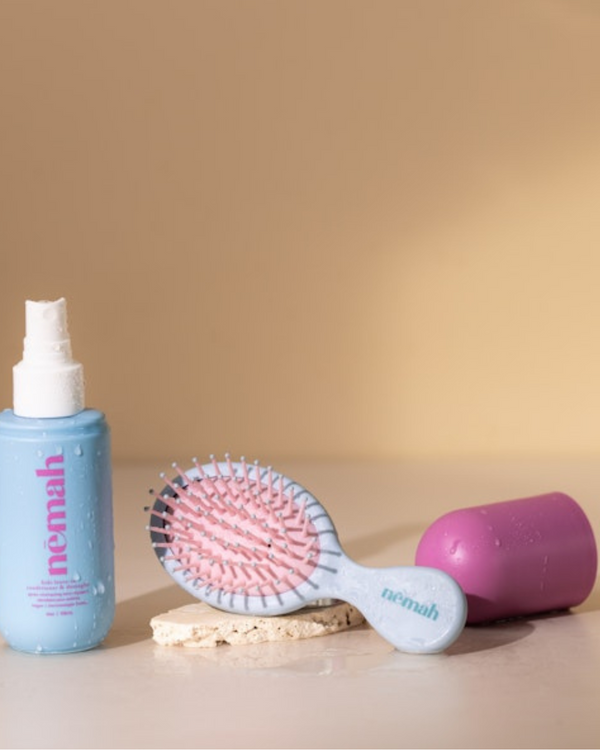 Kids detangling brush for smooth, tangle-free hair; perfect for babies and toddlers. Angle 2 view.