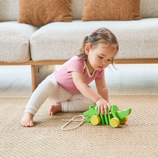 Cute Dancing Alligator hat, socks, and mittens set for babies, showcasing playful design from angle 4.