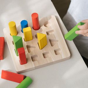 Geometric peg board for babies, promoting early learning and sensory play, viewed from angle 3.