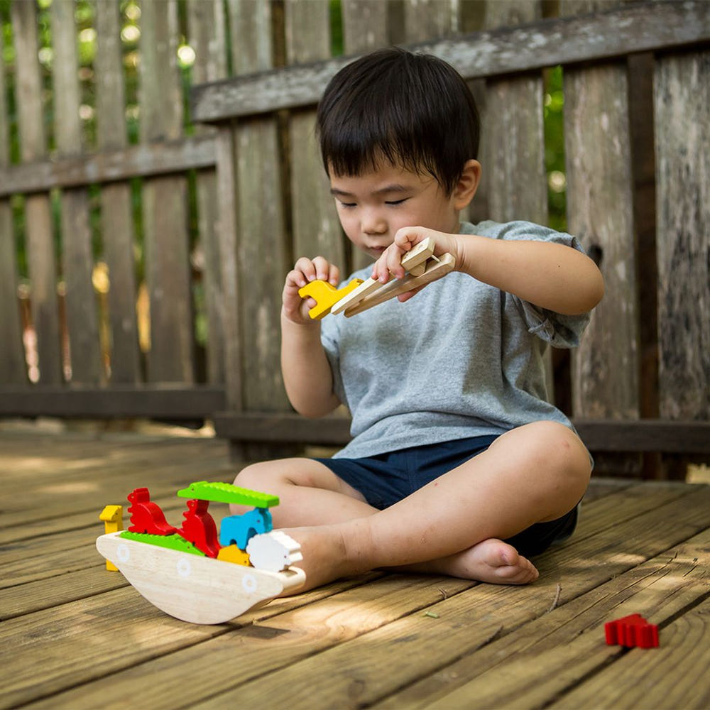 Colorful Balancing Boat for babies, promoting early learning and sensory play in a fun, engaging way.