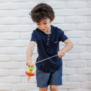 Baby Spaceship Top in angle view, featuring a fun design perfect for little astronauts.