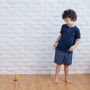 Baby Spaceship Top in playful design, angle view showcasing vibrant colors and soft fabric for comfort.