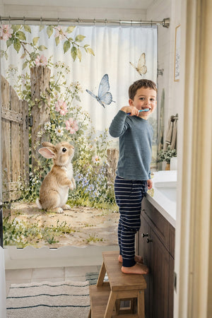 Child brushing teeth in a family bathroom with the Butterfly Gate Bunny shower curtain
