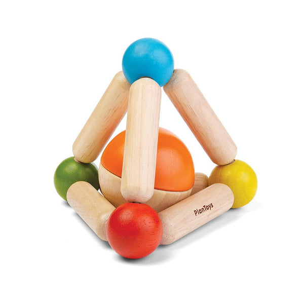 Colorful triangle clutching toy for babies, promoting sensory play and motor skills development.
