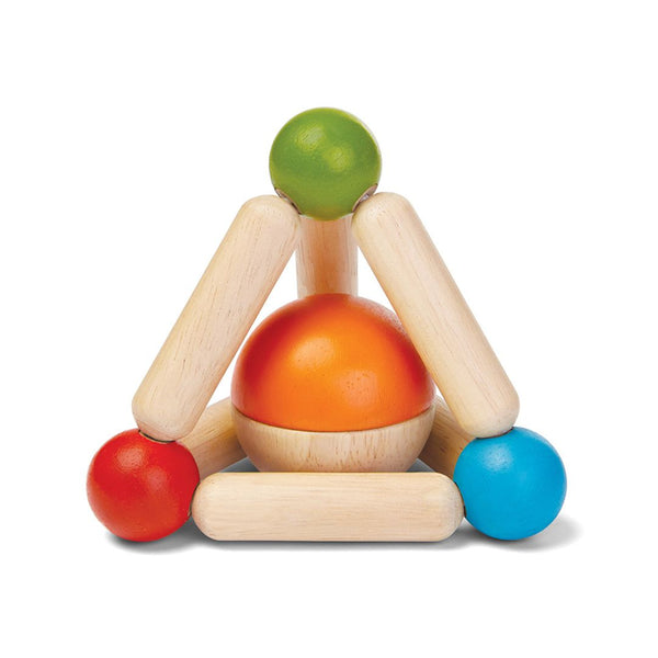 Colorful triangle clutching toy for babies, promoting sensory play and motor skills development.