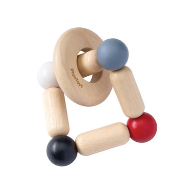 High contrast square clutcher for babies, promoting early learning and sensory play.