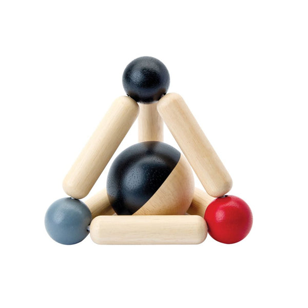 High contrast triangle clutching toy for babies, promoting sensory play and development.
