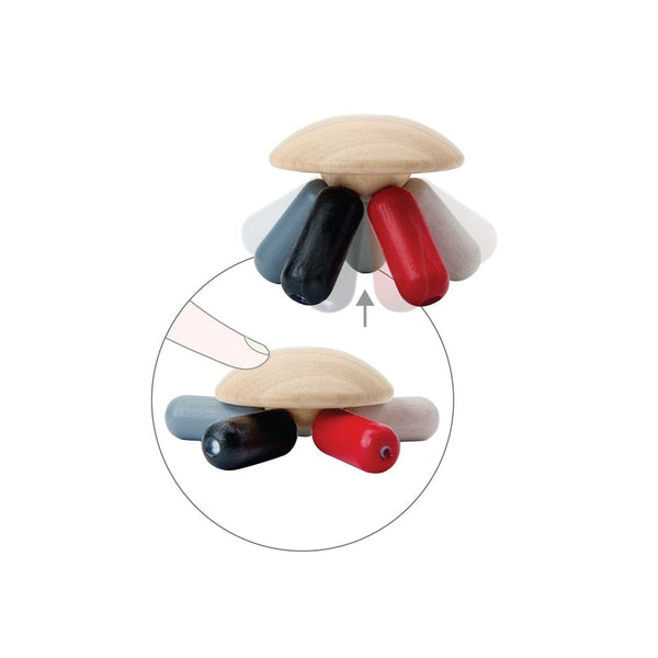 High contrast Flexi Jellyfish toy for babies, promoting early learning and sensory play. Angle 4 view.
