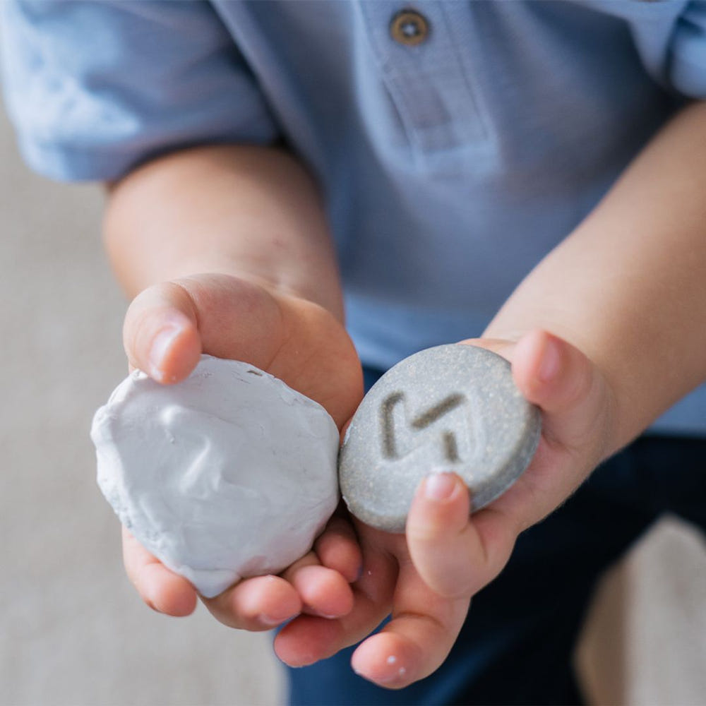 Colorful Tactile Stone toy for babies, promoting sensory play and development in a safe, engaging design.
