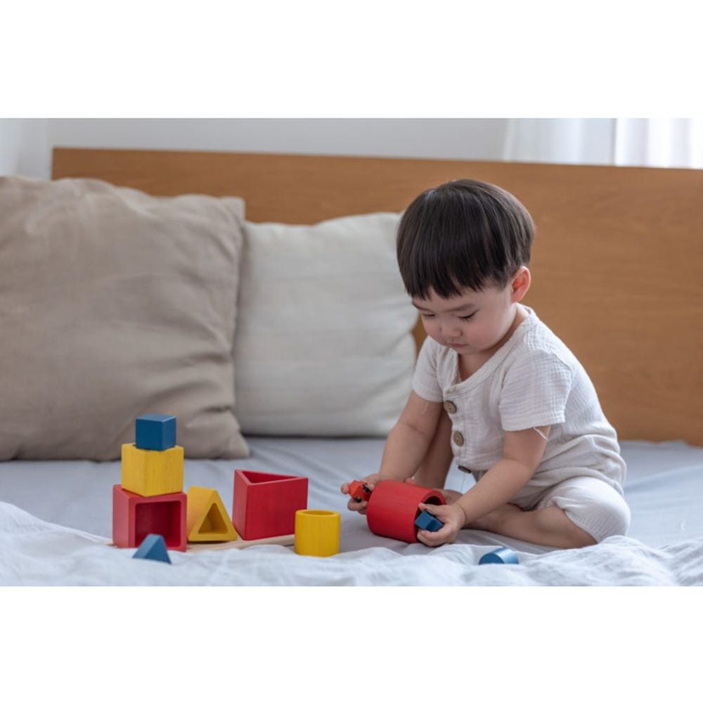 Nesting Puzzle - Unit Plus: Safe, engaging baby toy promoting cognitive development and fine motor skills.