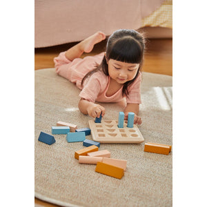 Geometric Peg Board - Orchard for early learning and sensory play, showcasing vibrant colors and engaging shapes.