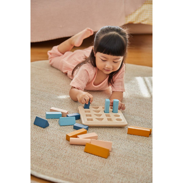 Geometric Peg Board - Orchard for early learning and sensory play, showcasing vibrant colors and engaging shapes.