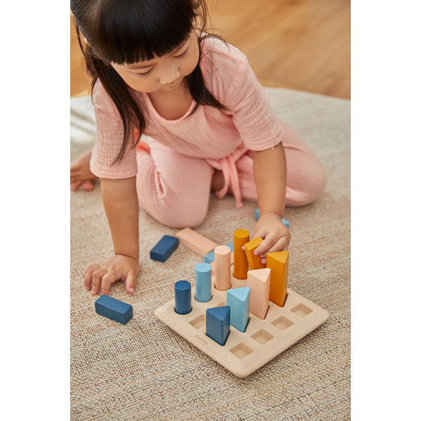 Geometric Peg Board - Orchard for early learning and sensory play, showcasing colorful shapes at an angle.