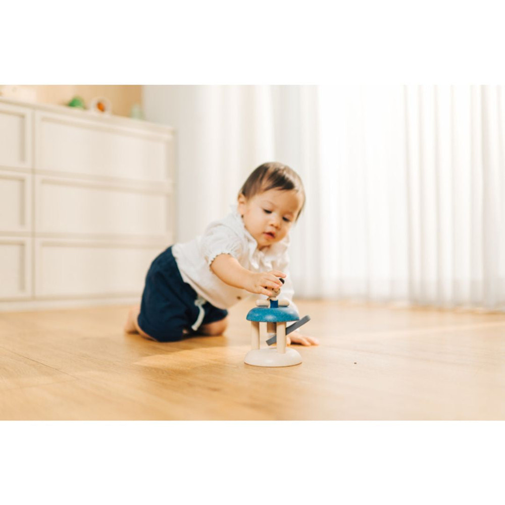 "Jumping Gymnast: Engaging early learning toy for sensory play and active fun for babies."
