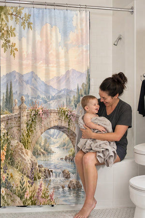 Mom holding her baby on the tub edge next to the Castle Bridge Fairy Tale shower curtain