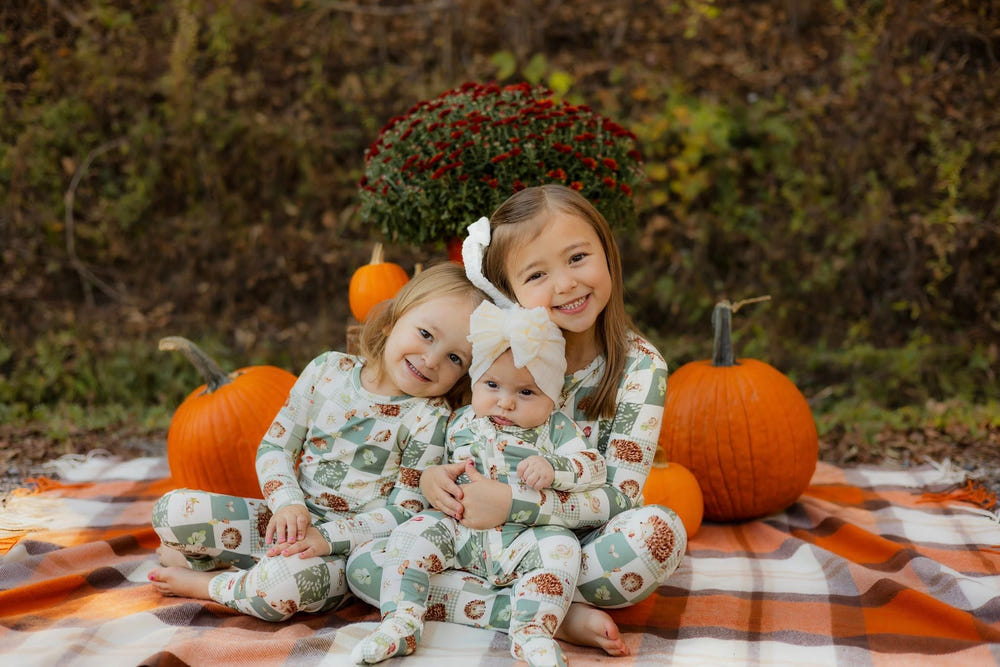 Harvest Hedgehogs Bamboo Zippy Pajamas for babies, featuring a cute hedgehog design and soft, breathable fabric.