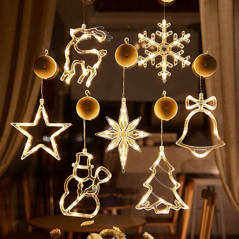 Christmas LED suction cup chandelier lights featuring Santa, elk, and snowman for festive window decor. Battery powered.
