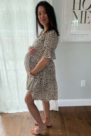Beige animal print ruffle sleeve maternity dress, stylish and comfortable for expecting mothers.