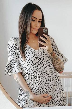 Beige animal print ruffle sleeve maternity dress, stylish and comfortable for expecting mothers.