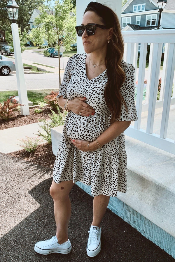 Beige animal print ruffle sleeve maternity dress, stylish and comfortable for expecting mothers.