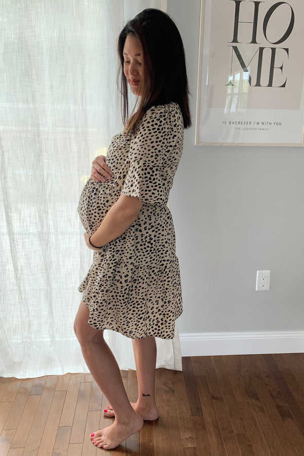 Beige animal print ruffle sleeve maternity dress, stylish and comfortable for expecting mothers.