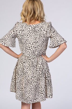 Beige animal print ruffle sleeve dress for babies, stylish and cute apparel for little ones.