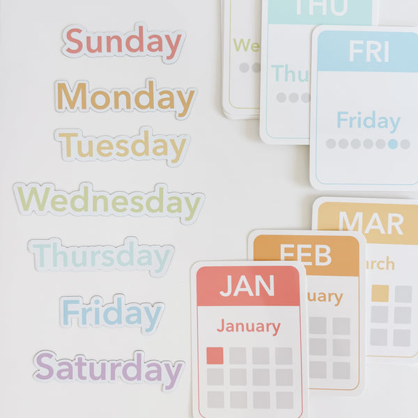 Colorful calendar flashcards and magnets for early learning, showcasing days, months, and seasons for sensory play.