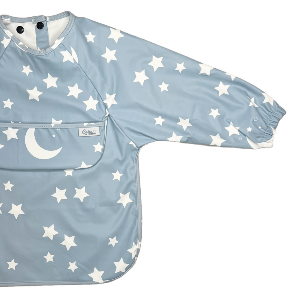 Grayson Long Sleeve Bib in Starry Night design, perfect for keeping babies clean during mealtime.
