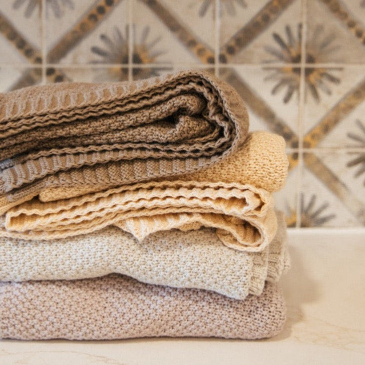 Soft knitted Julep swaddle blanket for babies, perfect for cozy comfort and warmth.