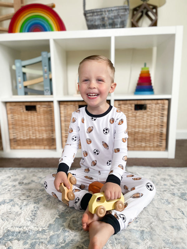 Dream Team Set sleepsuits and pyjamas for babies, featuring soft fabric and playful designs, angle view 3.