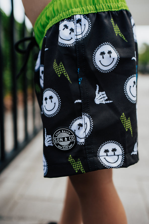 Sunshine State of Mind Swim Trunks for babies, vibrant design, perfect for summer fun and beach days.